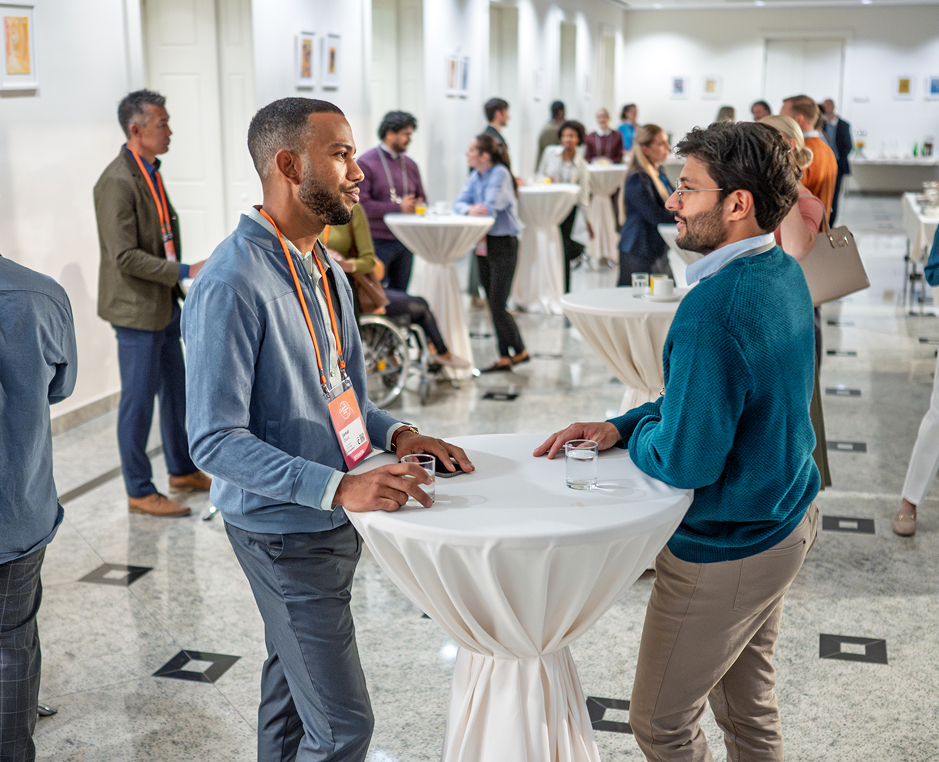 People networking at a professional event.